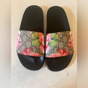 Gucci slides. Brand new never worn. Comes with all original packing. Authentic.
